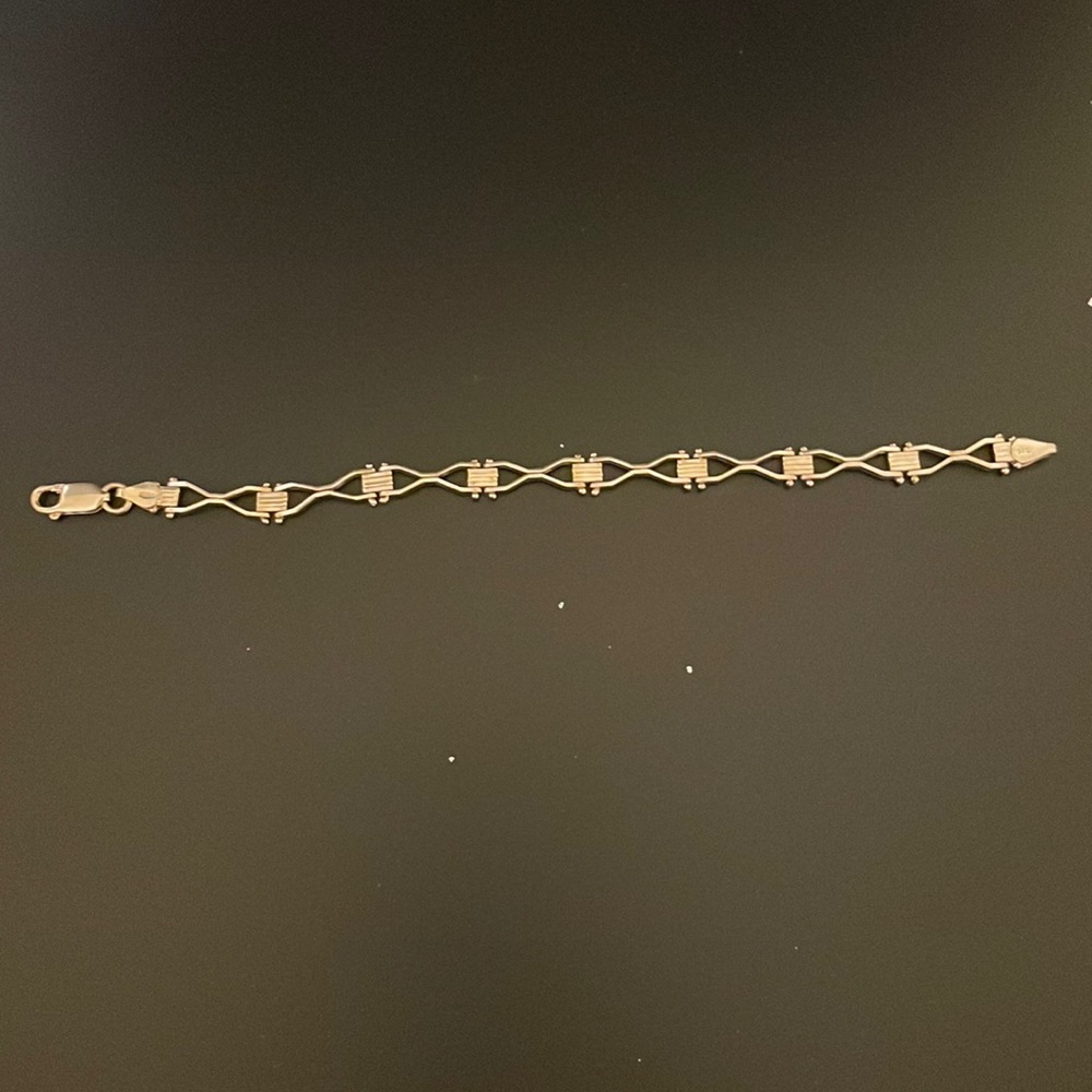 Silver bracelet.
